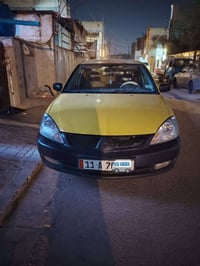 لانسر ٢٠١٠ • مكينة ٢٠٠٠ • ٤ قطع صبغ