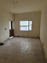 بيت مساحه 100 متر غرفه نوم واستبقال ومطبخ وحديقه وكراج والسطح يجار 250...