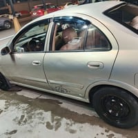 نيسان سني موديل 2007غاز بنزين رقم مميز  07724626221