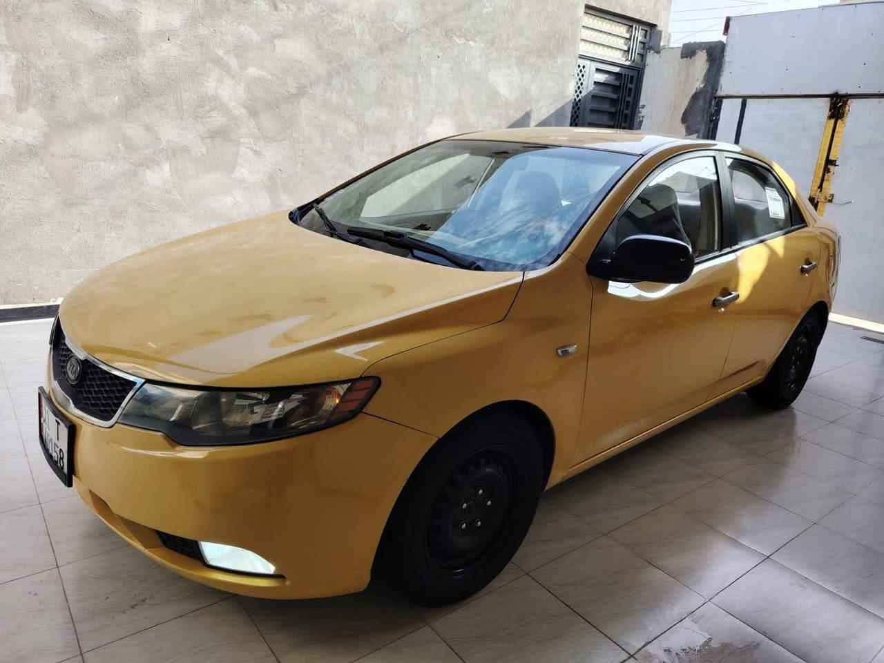 السلام عليكم كيا فورتي وارد أمريكي موديل 2011 حره تحويل ثاني يوم مشروع وطني سنويه ل 30 هزه جديده رقم بغداد بسمي مكفوله من الضربه والتبديل كير ومكينه وحداديه وتبريد تدفئه اربع تايرات جديدات دواخل جدد صبغه جديده مصفره هيئه وغرامات خط وبحث جوال ترايه كلش حلو السعر 80 مكان السيارة الناصريه مدينه الصدر التصال ***********
