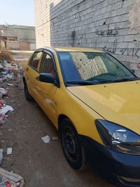 للبيع او مراوس حسب القناعه  لانسر 2009بغداد دولي مكينه 2000 السيارة صب...