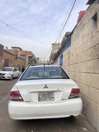 لانسر 2011 الشركة العامة سيارة كير اوتماتيك ماشية 190 الف سيارة خير من...