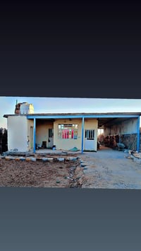 دونم • أشجار رمان وتين • دار وبئر ماء