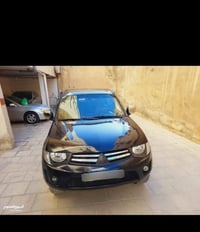 ميتسوبيشي L200 • ٢٠١٣ • مكيف ثلج