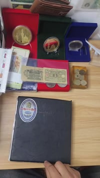 ألبوم عملات • ٨٠ عملة • مزاد