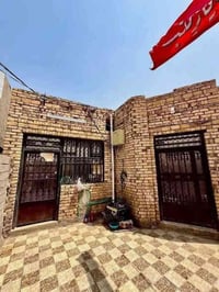 الديوانية حي الجامعة • ٢٠٠م • واجهة شارع تجاري