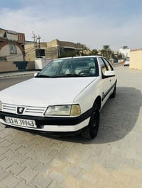 بيجو 405 • رقم بغداد • مشروع وطني