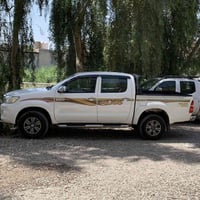 للبيع هايلوكس 2014 رقم سليمانية ماشية 214 الف حقيقي  سونار موضح بالصور...