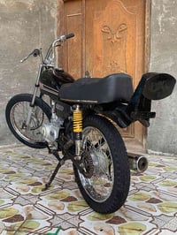 GT125 • دراجة • حله