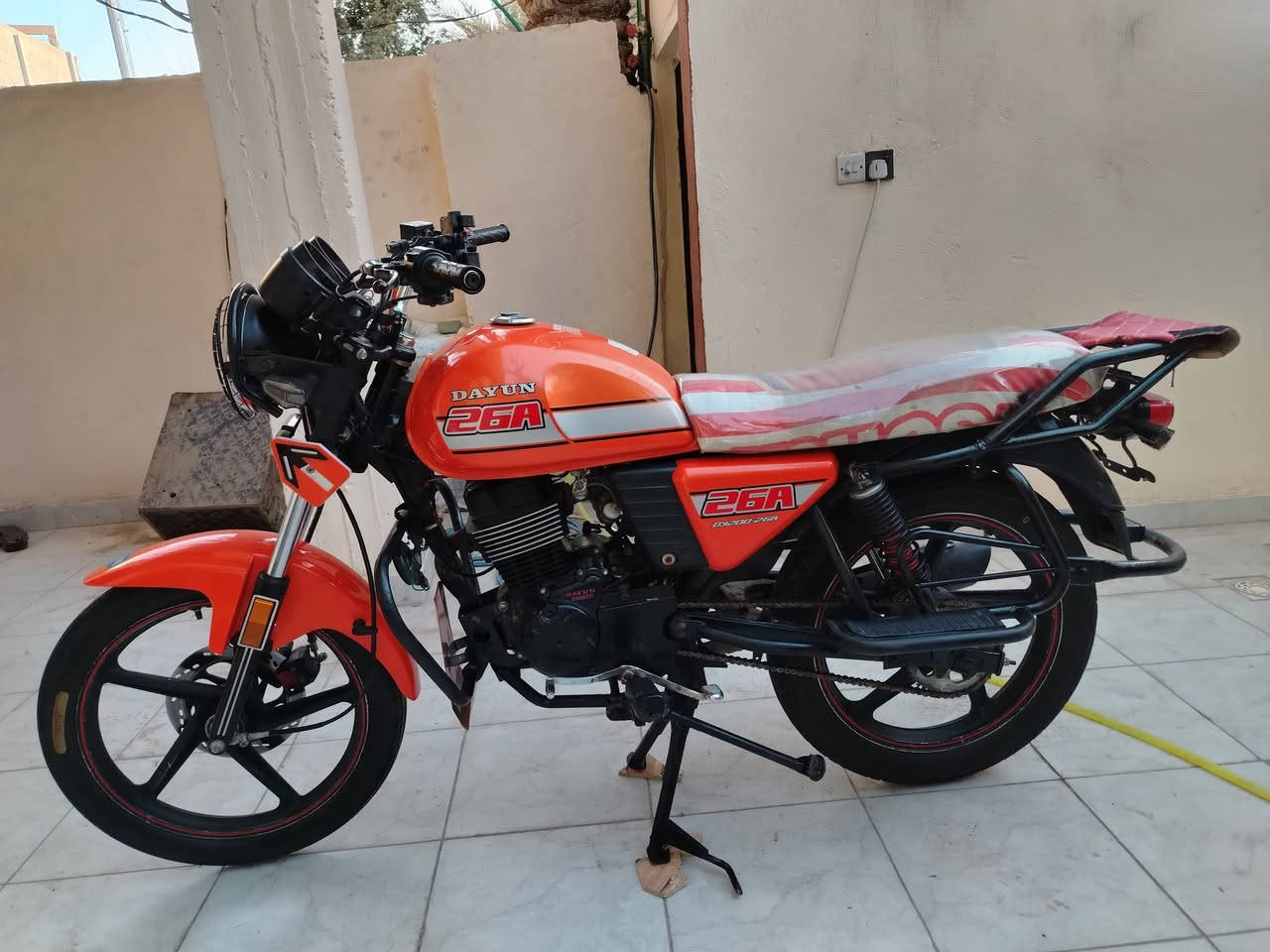 دايوان نفخ ٢١ .. أوراق اصولي شرط ترقيم  محرك مكفول حجم ٢٠٠ سيسي .. لايت جمجمه.. زوج تاير جدد .. كهربائيات كامله .. دراجه جديده ونصبتها حلوه مكاني كربلاء.. والشراي يتصل ***********
