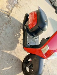 دراجه بوليس مفتوحه نقصها كابريتر وصالنصه السعر 350   الرقم 07874999611