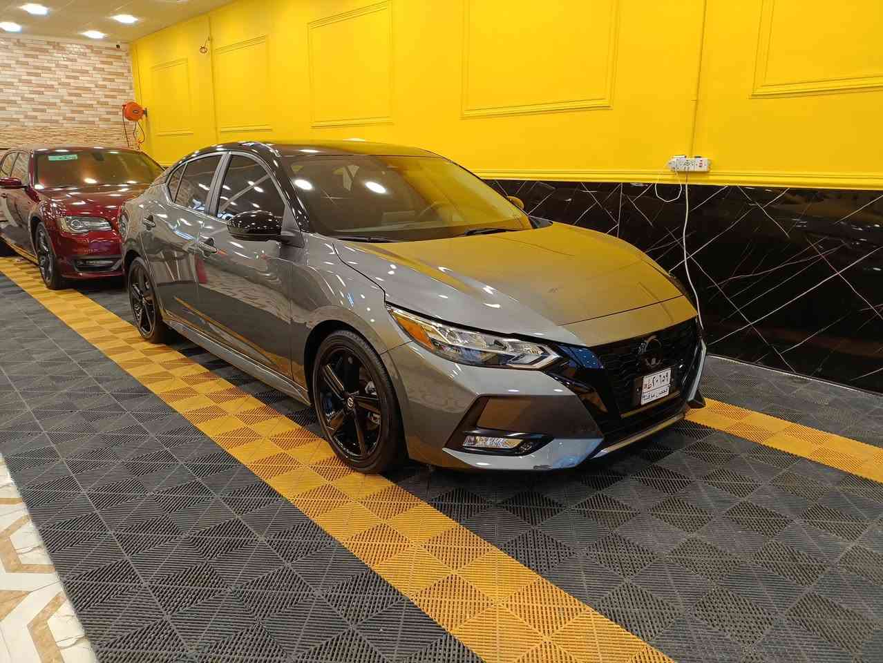 نيسان سنترا SR Midnight 2023
4 سلندر محرك دووووش cc 2000 
‎مواصفات SR 
‎بصمه عدد(2)
‎بلوتوث + aux + carplay + Android Auto
‎ثلاث وضعيات قيادة  Sport -Eco - Normal
‎كير أوتو 
‎تبريد منفصل 
‎مثبت سرعه 
‎نظام ABS
‎مانع انزلاق
‎حساس أطارات 
‎بك لايت ليد
‎شاشه كبيره
‎كامره دواره
‎كشافات امامي
‎شاشه اعطال
‎كشنات مخمل
‎رادار 360 درجة
‎رادار نقط العمياء
‎رادار الخطوط البيضاء خروج عن المسار
‎ئوتو بريك امامي وخلفي
‎ويلات السيارة اسود رياضي
Led +  زينون
‎فول تحكم ستيرن
‎تشغيل عن بعد  
ماشية (( 27 الف كم ))
        بدوووون حادث // تقرير غرق مأشر للدوسة فقط// تعمل وتسير من امريكا //
السيارة مكفولة شرط الفحص  
رقم ((بصرة))باسمي

***********
