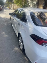 كرولا هابيرد ٢٠٢٤ فتحه بصمتين مثبت سرعه تثبيت مسار بعد بيه موصفاته معر...