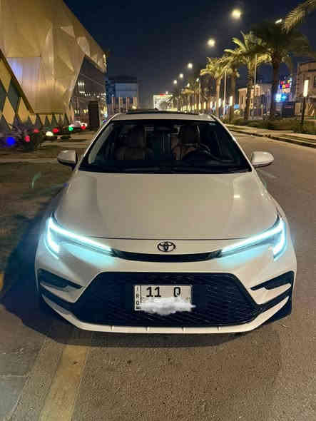 تحيه طيبه السلام
كورلا 2024 s وجهه أمريكي 
فول مواصفات 
ماشي 15 ألف 
مكينة 1800
بصمه تشغيل 
بصمه ابواب 
داخل جلد قرمدي 
شاشه كاميرا 
فتحه اشاير 
مري شفط
كرسي كهرباء 
حساساات أمامي خلغي 
تبريد شاشه 
تبريد أمامي خلفي 
فول مواصفاته هايبرد
رقم بغداد دولي باسمي 
152, ورقه 
أي استفسار 
*********** 
مكان بغداد دوره
