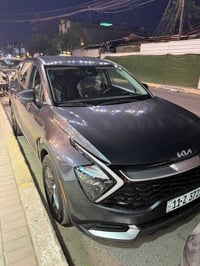 عندي سبورتج وارد امريكيً للبيع موديل 2023 محرك هايبرد 1.6 T ماشيه ٤٧ ا...