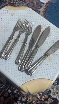 سكاكين • فضة • مختومات أسد وتاج