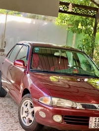 بروتون • 2005 • كابريتر 1600