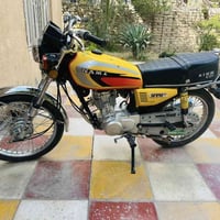 دراجة نارية • موديل ٢٥ • أوراق سكنر