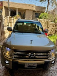 باجيرو 2010 خليجي مكفولة من الضربة والصبغ 6 سلندر 7 راكب فور ويل شاشة ...
