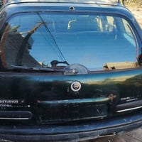 اوبل اوميكا بزون ستيشن للبيع  لون زيتوني رقم  بغداد محركة ونجي 2500 مك...