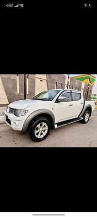 ميسوبيشي بيكب  2015 طالعة من الشركة بل 2021   رقم بغداد  الماني فول 6 ...