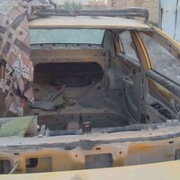 اخواني كشر  داخلي وخارجي كامل وبيبان وبنيد سيارة ليفان  للبيع 07764254...