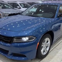 مطلوب مراوس بbmw الفئة الثالثة او الخامسة جارجر 2023  SXT ازرق بحري بد...