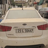 كيا سيراتو ٢٠١١ فول بيها قطعه وحده بدون داخل  باب عكس سايق.فقط جاهزة و...