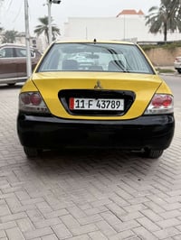 لانسر • ٢٠١٣ • مكينة ٢٠٠٠