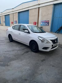 نيسان صني بليته الزركه  ماشيه ١٨٠  مابيها بس بارد وضرر خفيف ب جامله ال...