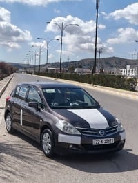 نيسان تيدا • ٢٠٠٩ • توماتيك