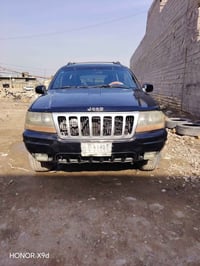 جيب شيروكي موديل ٢٠٠٠ مكينه ففتي ٣٠٠٠ ب ٥٥ وبيها مجال بغداد حي اور ٠٧٧...