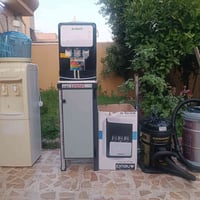 بيع 2 براد ماء + مكنسة كهربائية عدد 2 ..وكلهم بحالة جيدة وجديده.. الات...