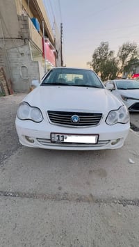 كوبون بنزين • رقم بغداد • شاشة وكاميرا