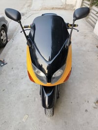 دراجه تيماكس 2008 دراجة مصبوغه لون اصفر ومكينة مبدل بيها يطغ مال ثكاله...