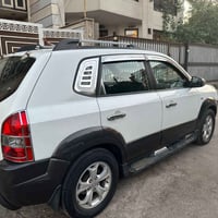 توسان موديل ٢٠٠٩  محرك كايم رقم بغداد باسمي بيها بس صبغ جهة السايق تبر...