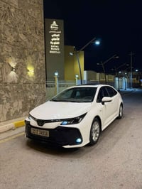 كورلا 2024  شكل الخليجي محرك 1800 هايبرد HEV  داخل جلد اسود رقم بغداد ...