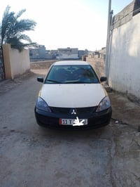 لانسر • ٢٠١٠ • كير ومحرك مكفول