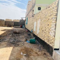 بيت وقطعة أرض • ٥٠٠م • الكوفه شارع المعمل