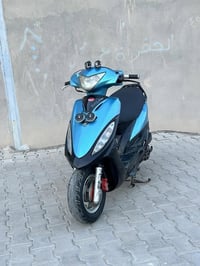 كامكو • جي فور • محرك مفتوح