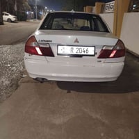 لانسر مديل ٩٩ للبيع 47 ورقه وبيه مجال 07823729922