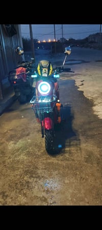 دراجة كهربائية • لون أحمر • أضواء LED