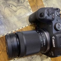 كانون R7 • عدسه 18-150 • ملحقات كامله