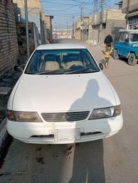 نيسان صني موديل 1995   محرك وكير مكفولات   سياره بيه رشات صبغ مثل دعام...