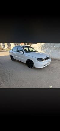 سياره دايو لانوس موديل 2000 محرك 1600 كير اوتو  تخم تاير جديد السياره ...