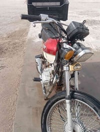 دراجه أربعه كير البيع 07812487401