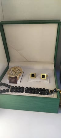 ساعة رجالية • تصميم عصري • توصيل الفلوجة