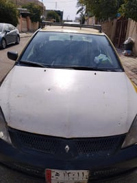 لانسر 10 • اوتوماتيك • صاحبه شرعي بعقوبه