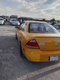 نيسان صني 2012 منظومة غاز ودفتر بانزين شرط التحويل سعر85  07706117974