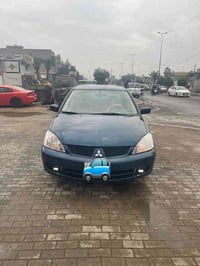 لانسر 2011 شركة العامة مطلوبة للمصرف مابيها تسديد متوقف رقم الماني سنو...